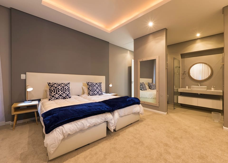 One of the two smaller bedrooms, with en-suite bathroom