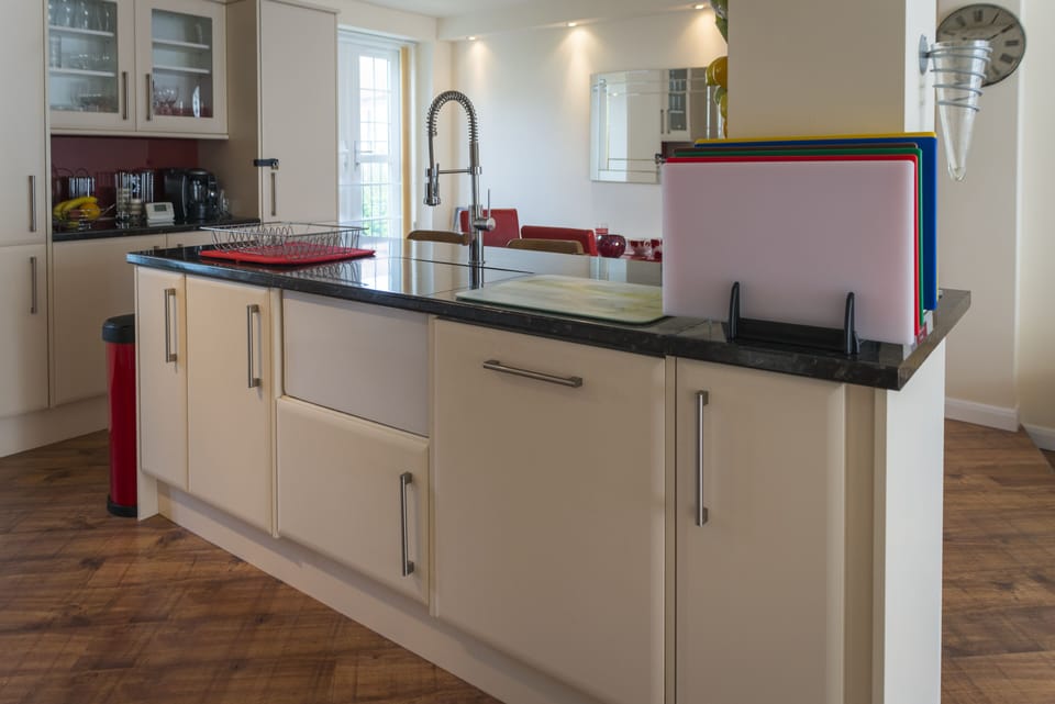 Butlers sink, dishwasher & breakfast bar area the other side 