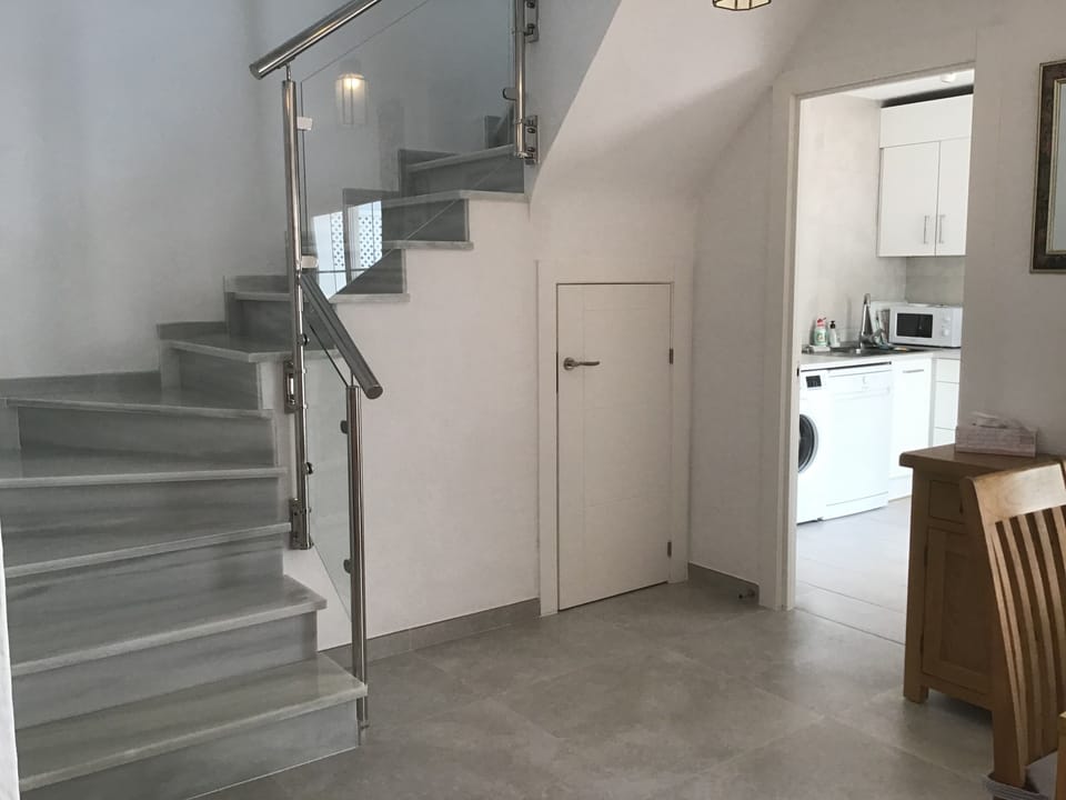 Fully equipped kitchen with induction hob, washing machine and dishwasher