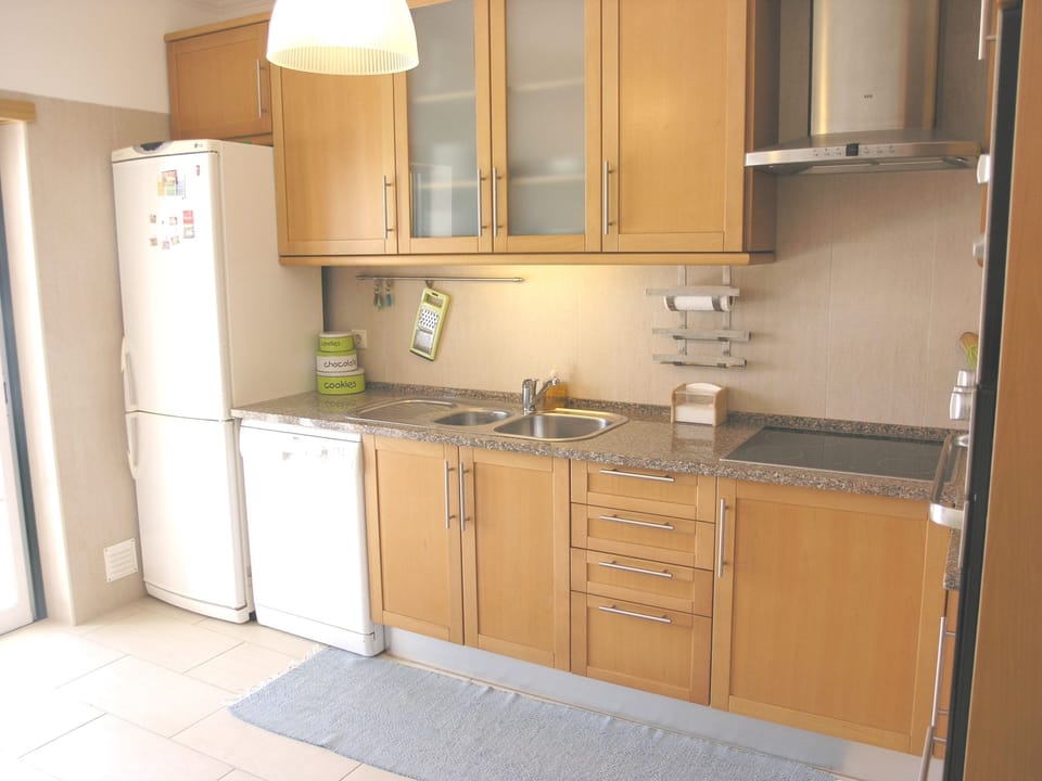 Very well equipped with modern appliances and doors leading to terrace