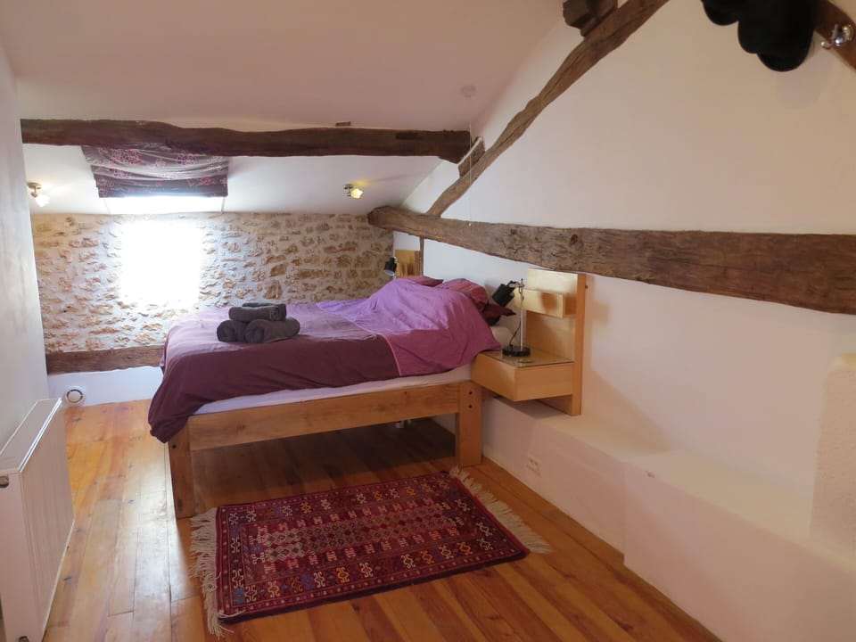 Bespoke walnut bed