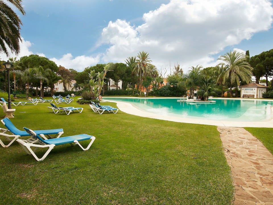 Swimming Pool, Property, Resort, Grass, Leisure, Sky, Sunlounger, Outdoor Furniture, Lawn, Real Estate