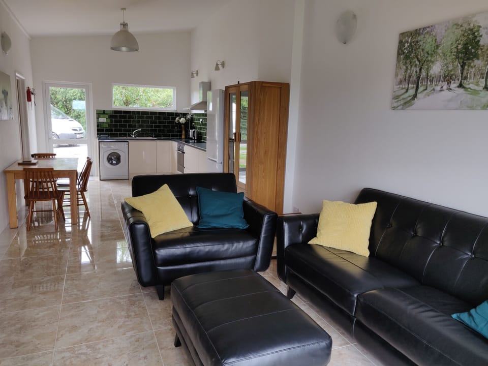 Comfortable 4 seater sofa and "cuddle chair".