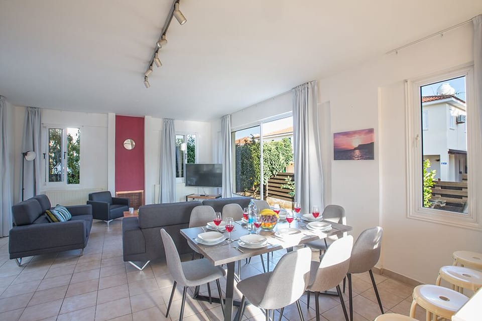Dining area with table and chairs to seat 8 persons