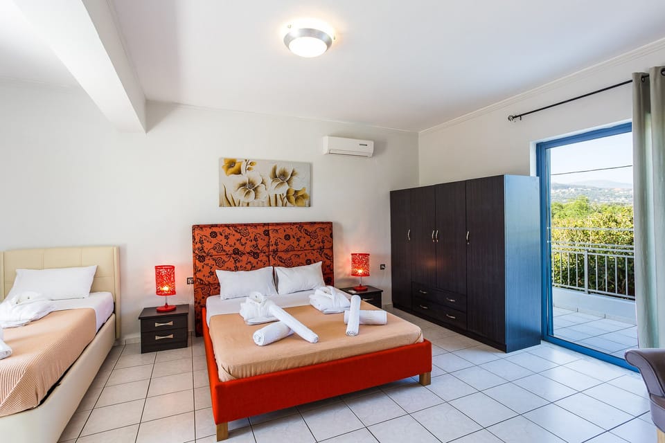 Bedroom with a double bed and single bed on the first floor