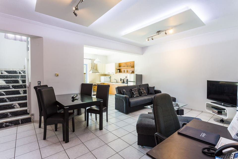 Dining area and stairs leading up to bedroom
