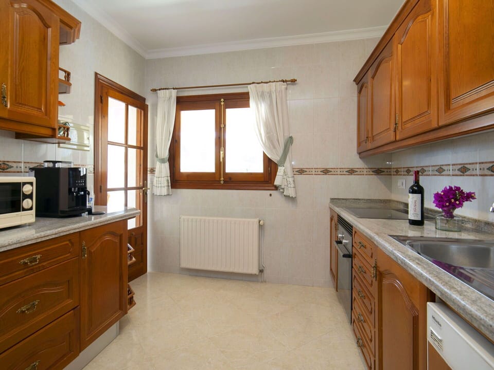Kitchen, Cabinetry, Countertop, Flooring, Interior Design, Wood, Furniture, Kitchen Appliance, Floor, Major Appliance