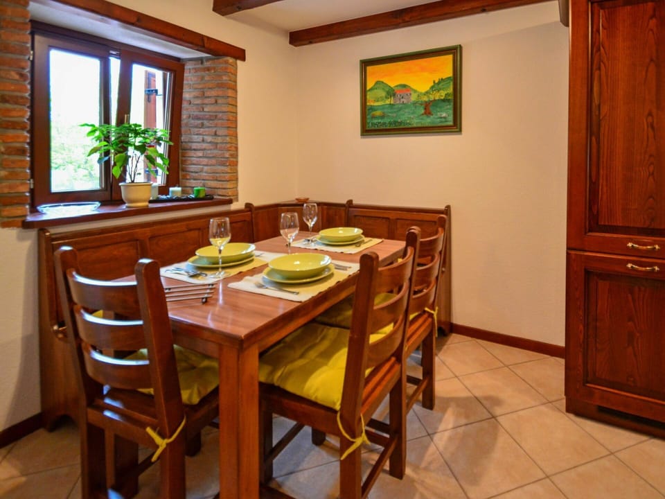 Furniture, Table, Window, Tableware, Chair, Cabinetry, Wood, Kitchen & Dining Room Table, Wood Stain, Floor