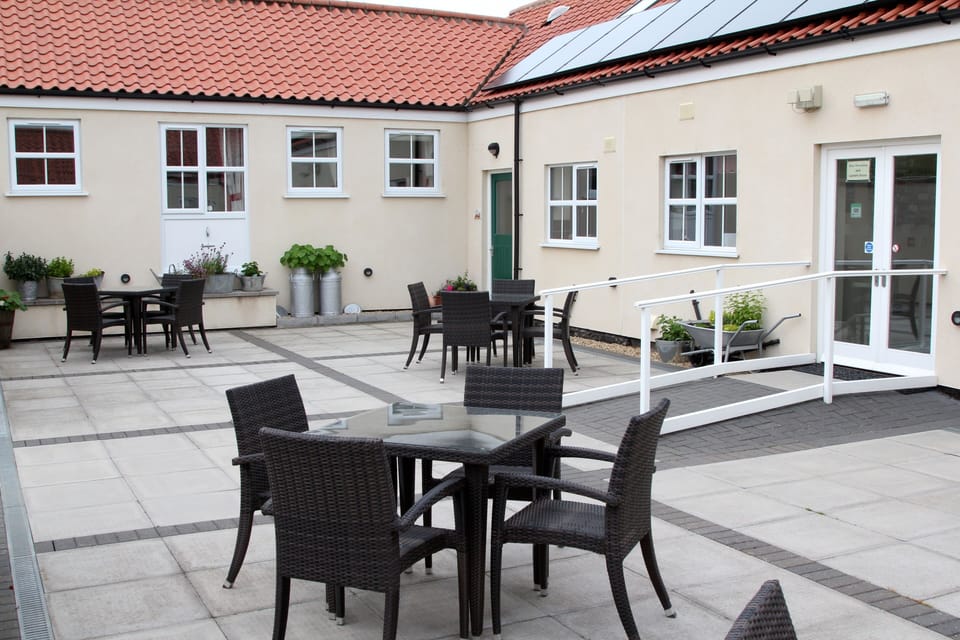 Courtyard, sheltered & sunny, perfect for al fresco lunch or a pre dinner wine