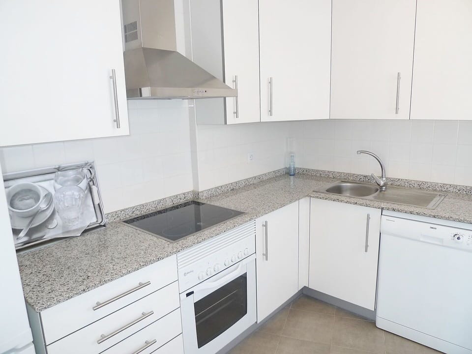 Countertop, Property, Room, Kitchen, Cabinetry, Furniture, House, Floor, Real Estate, Tile