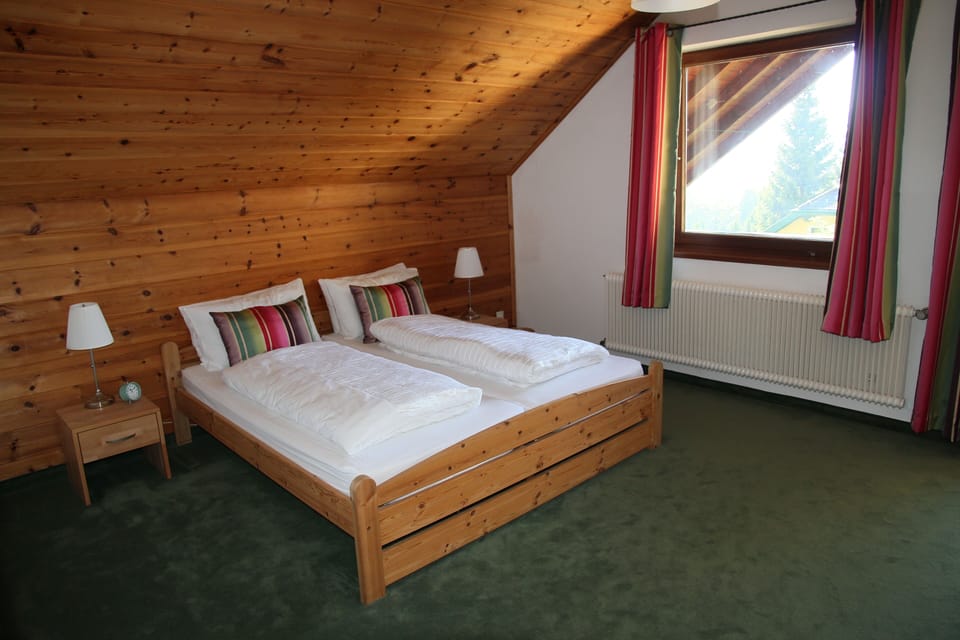 First-floor double bedroom with balcony