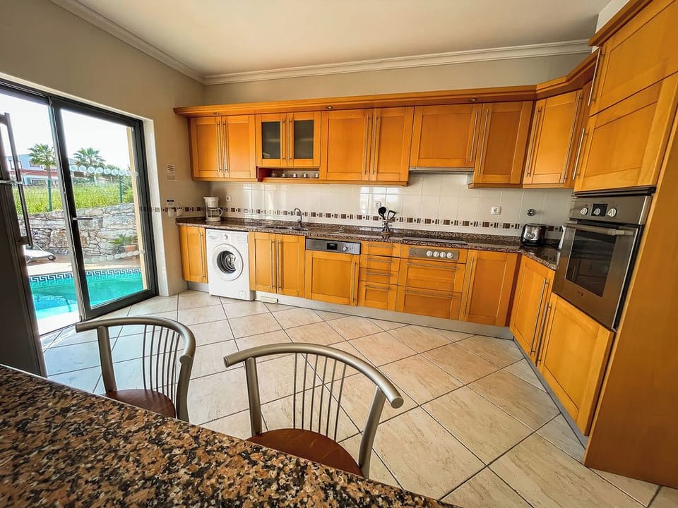 Every facility is here for you in the well equipped kitchen.