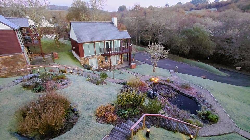 View of courtyard and parking area from balcony on a frosty winter morning