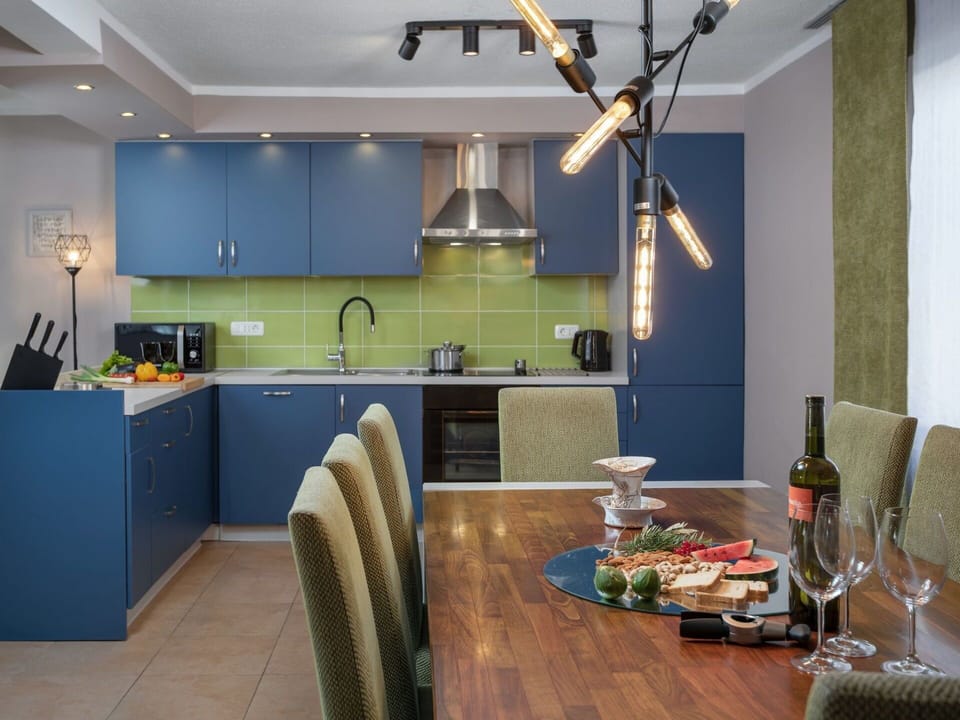 Room, Countertop, Green, Furniture, Property, Interior Design, Kitchen, Building, Ceiling, Cabinetry