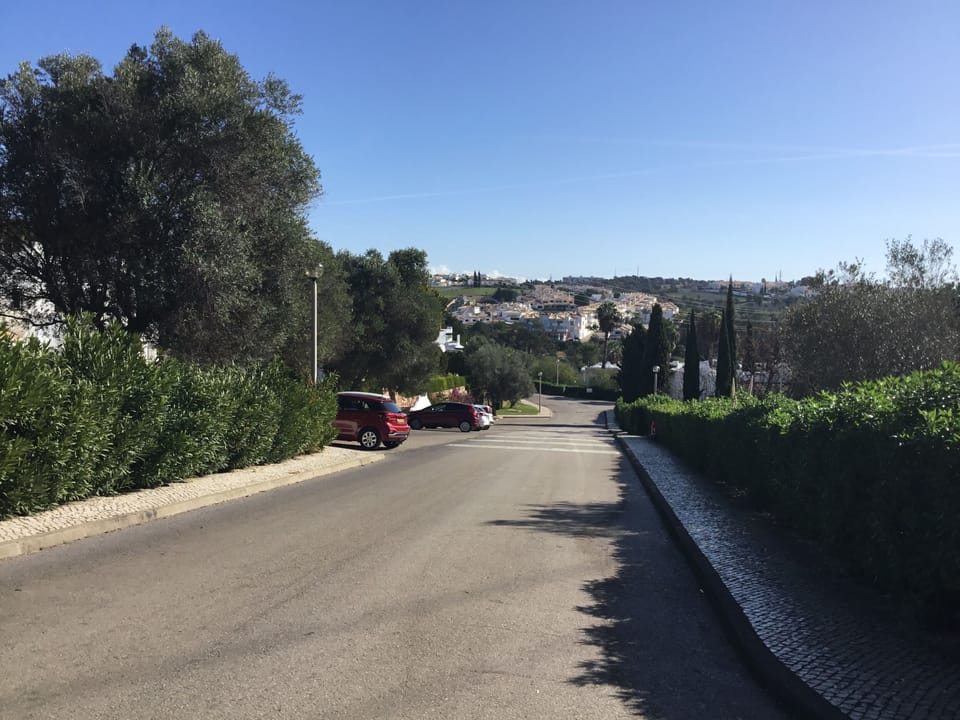 Ample free parking spaces to the front of the apartment block