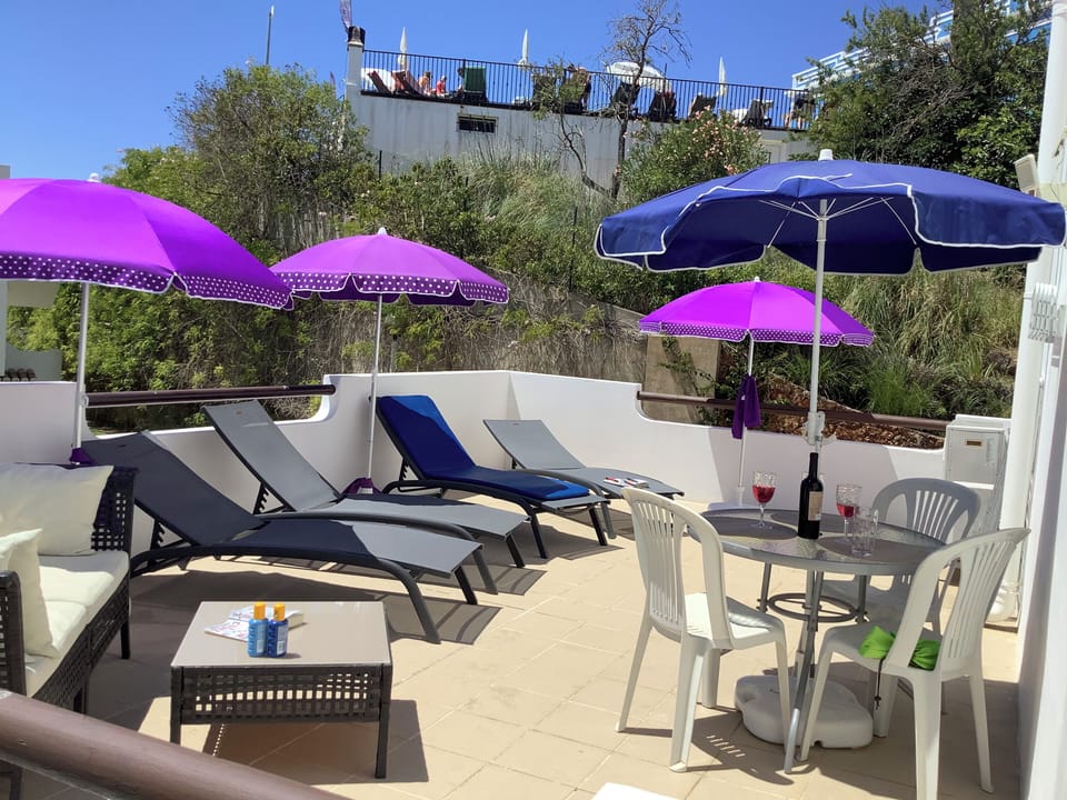 Large South facing  balcony with plenty of space to dine, relax and sunbath.