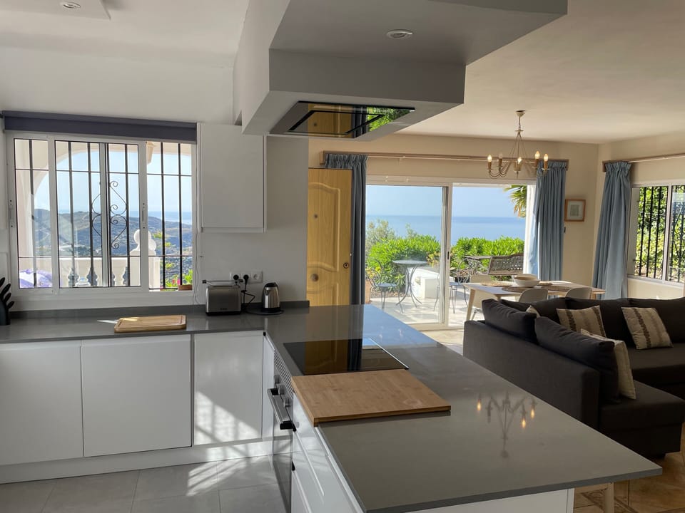 Upper kitchen and lounge view