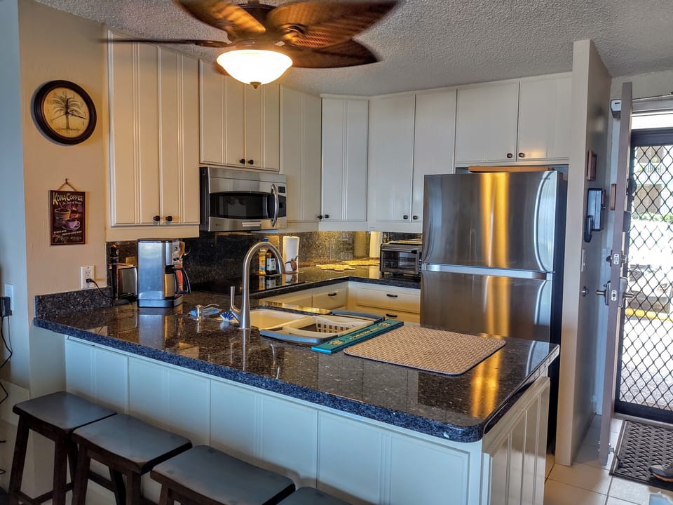 Closer view of the kitchen and newer appliances