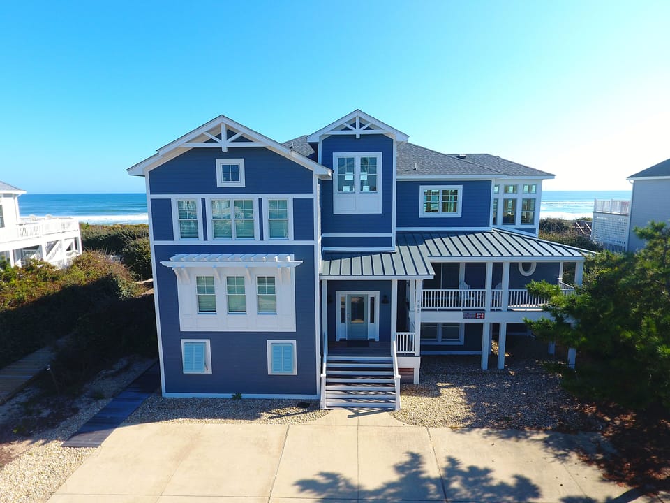 House front, driveway parking for 11