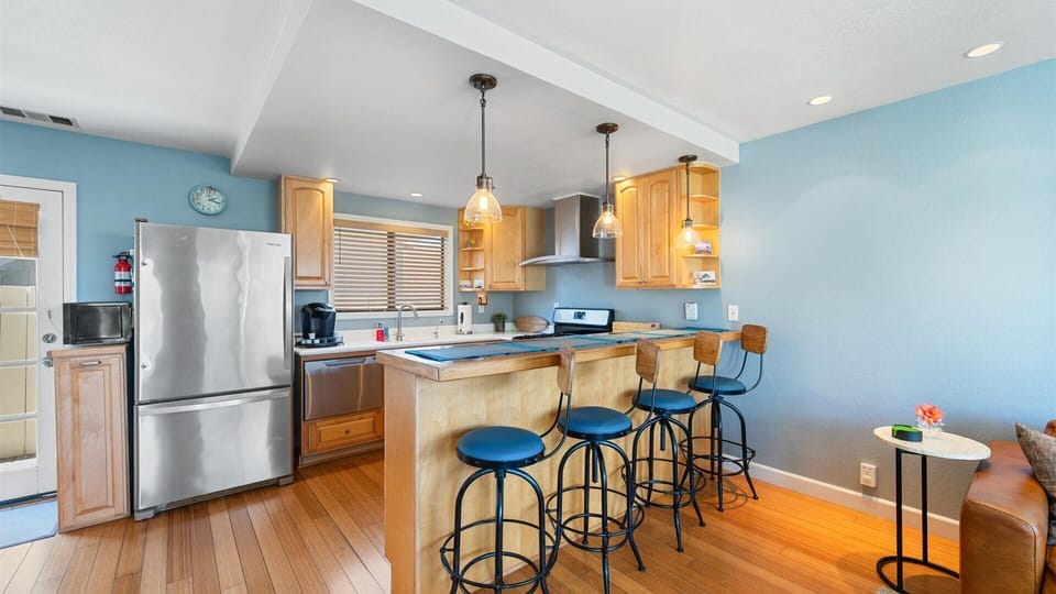 Your well equipped kitchen awaits with a breakfast bar, perfect for meal time spent together.