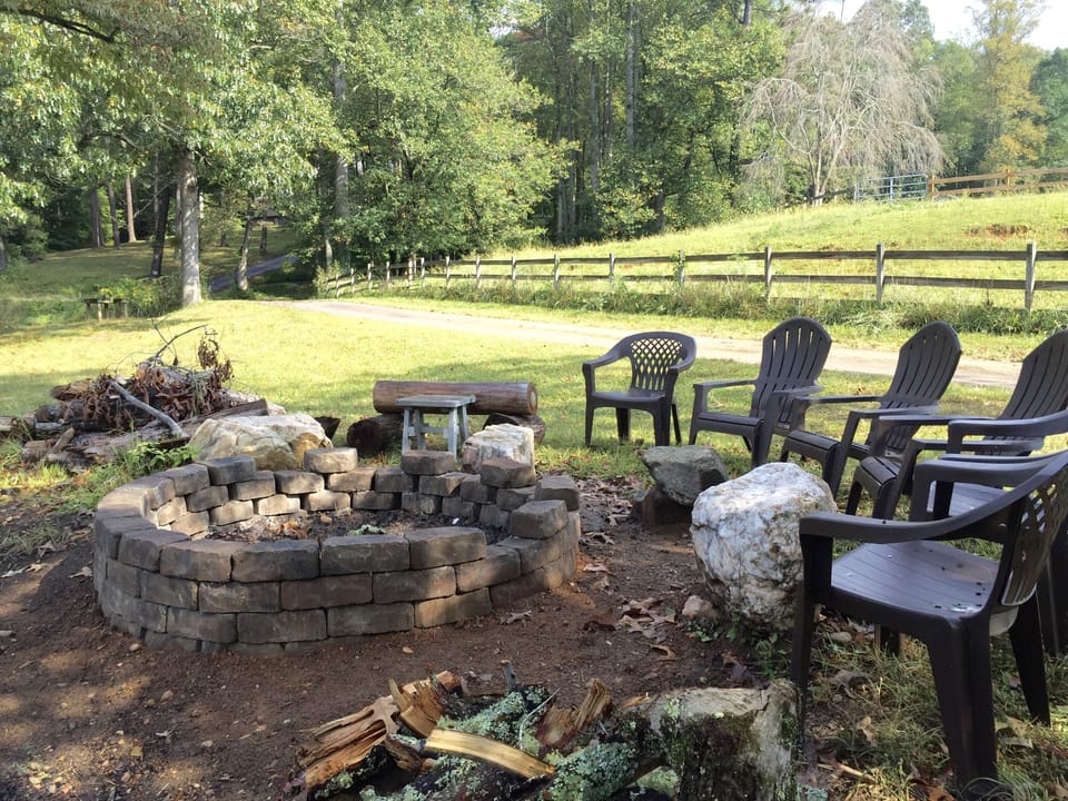 Lakeside Fire Pit has  chairs,  table and safety sand and water buckets