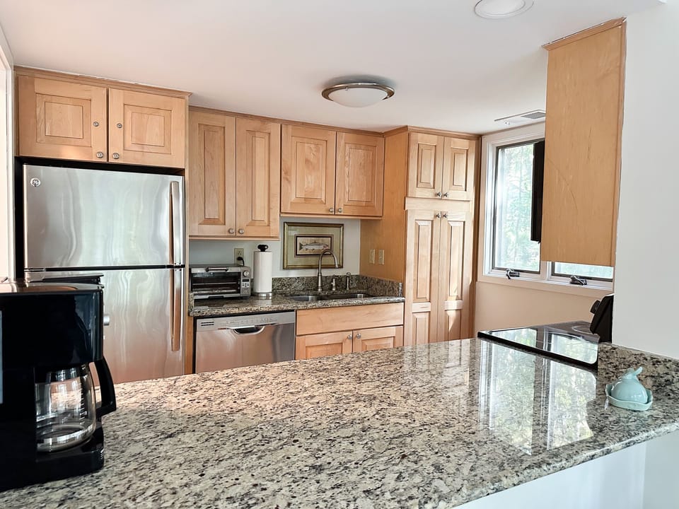 Full size appliances, serving and prep area