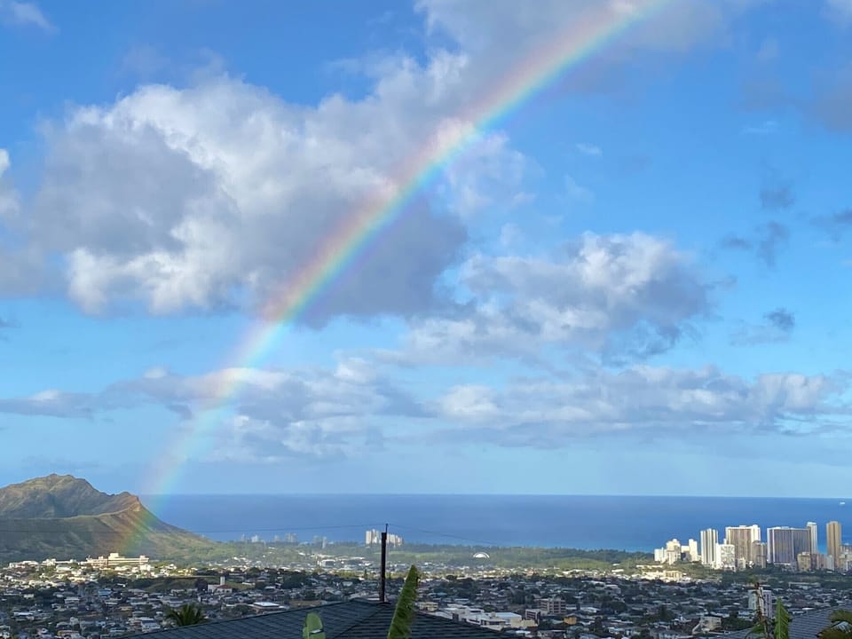 View from lanai-Rainbow over Diamond Head, ocean & Waikiki