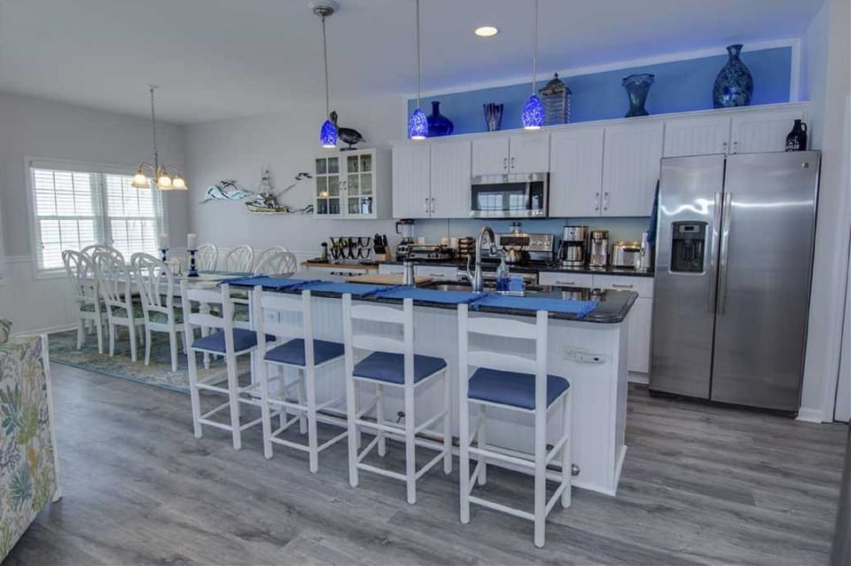 Kitchen with Granite countertops and counter seating