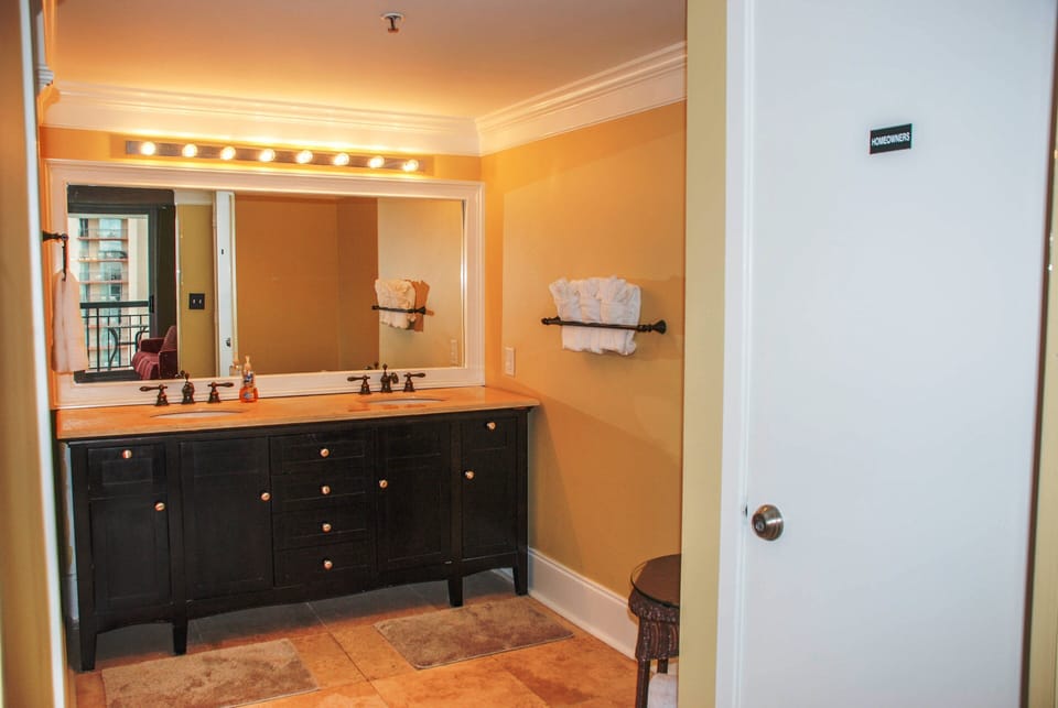 Double sink vanity with plenty of space to maneuver and store items!