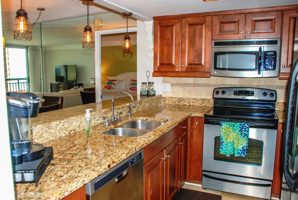 Stainless steel major appliances, marble flooring and many added conveniences