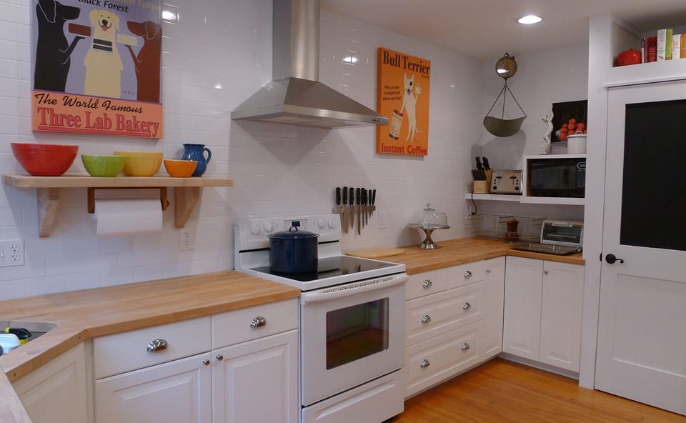 Lots of counterspace with and cooking supplies.