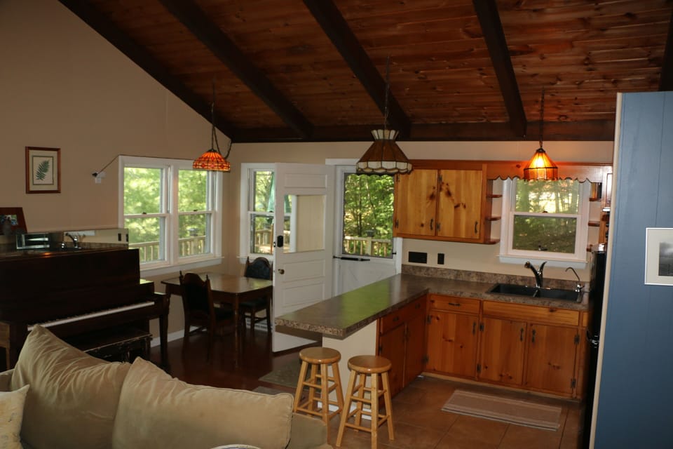 Kitchen and Dining area, with view of lake, next to Living Room