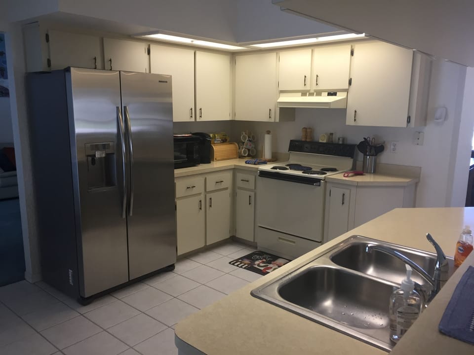 Kitchen, double fridge freezer, ice maker, electric cooker, microwave&dishwasher