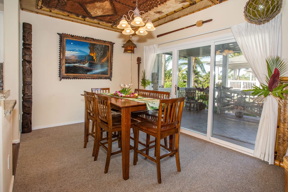Table looks out onto lanai. Eat outside on lanai also an option. 