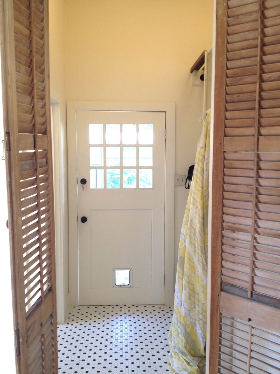 From the bedroom the built-in closet on the right, bathroom on the left