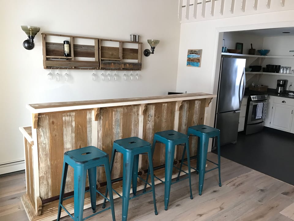 Bar seating for 4 for entertaining including bluetooth Speaker tower