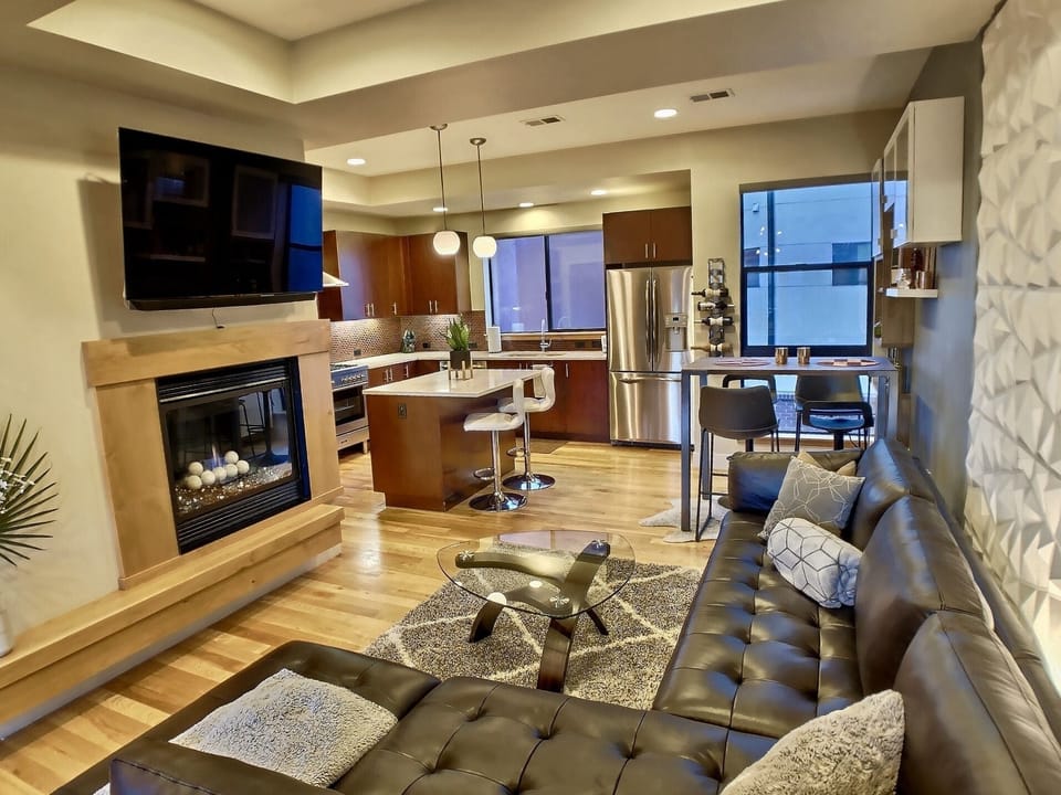 Open Plan Main Floor with Kitchen and cozy fireplace