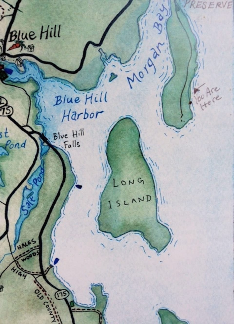 Cut out from a hand drawn map. See arrow "You are here!"