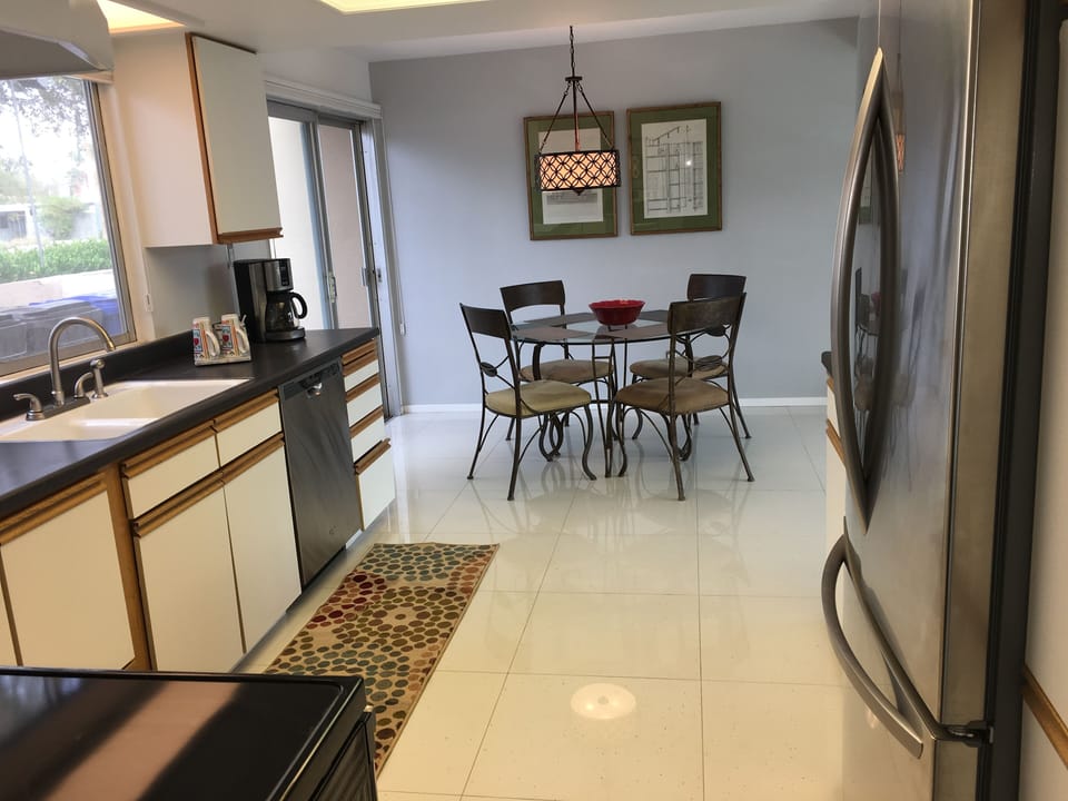 The kitchen includes pots, pans, dishes, utensils, coffee maker, toaster, etc.