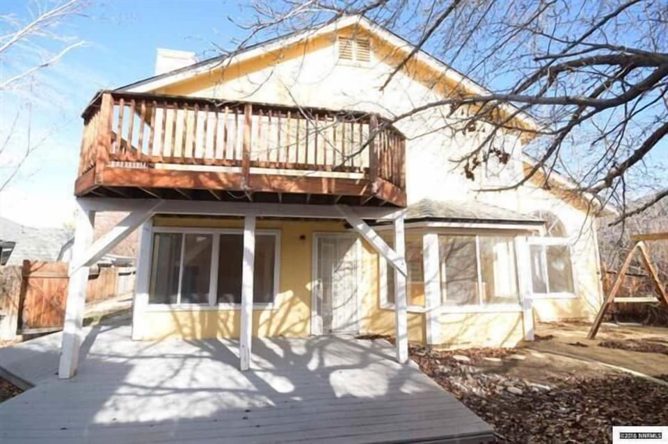 PRIVATE FENCED BACK YARD WITH GARDEN DECK AND GAS BARBECUE GRILL