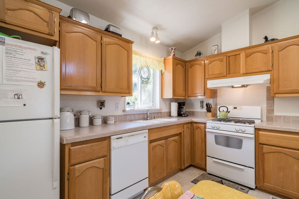 Kitchen: gas stove & oven. Plenty of cabinets stocked with all utensils.