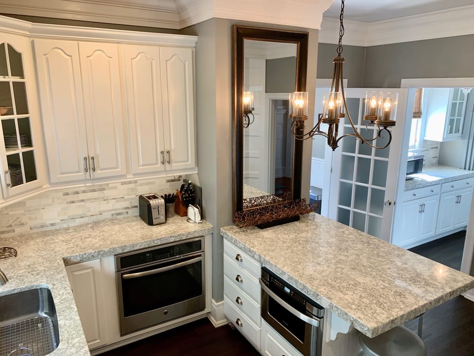 Another view of the kitchen - double sink, drawer microwave, convection oven