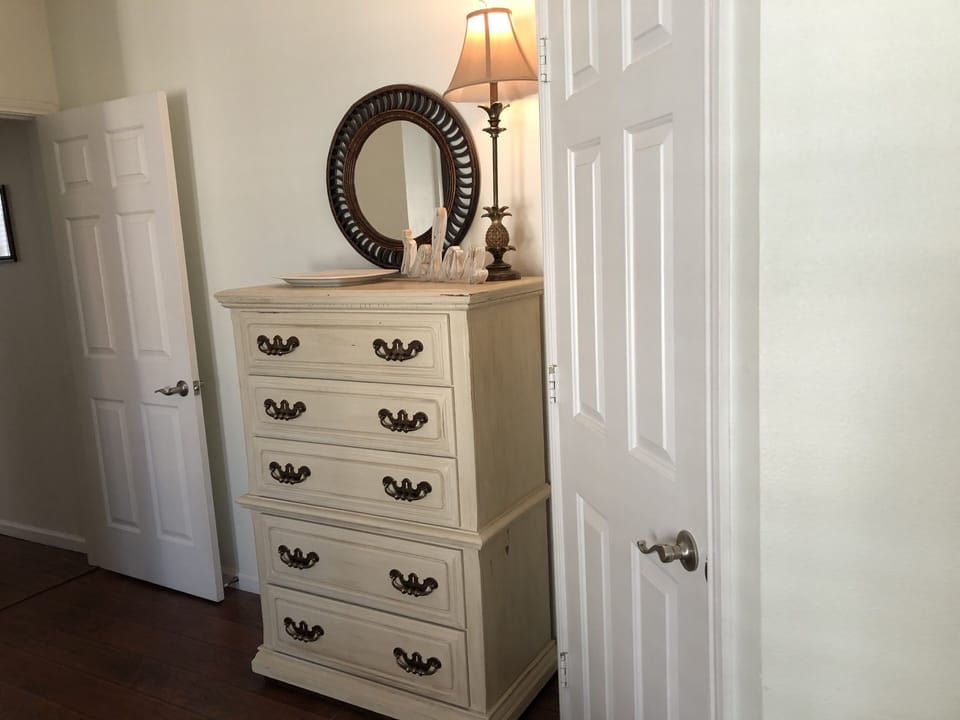 Walk-in closet and more storage for clothing . Games in bottom drawer! 