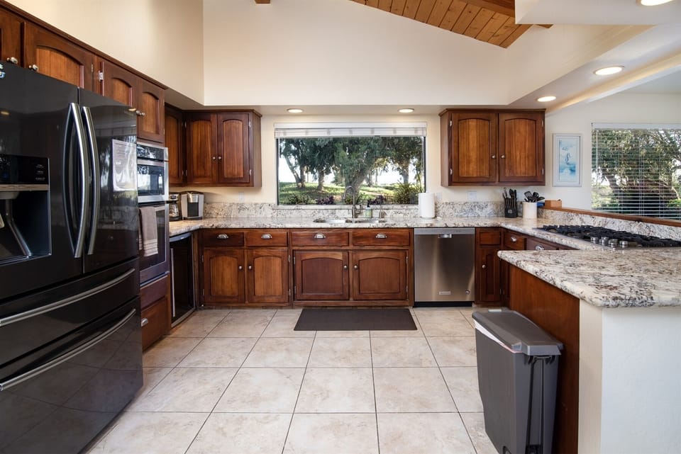 The kitchen was recently remodeled and now has all stainless steel appliances and granite countertops.