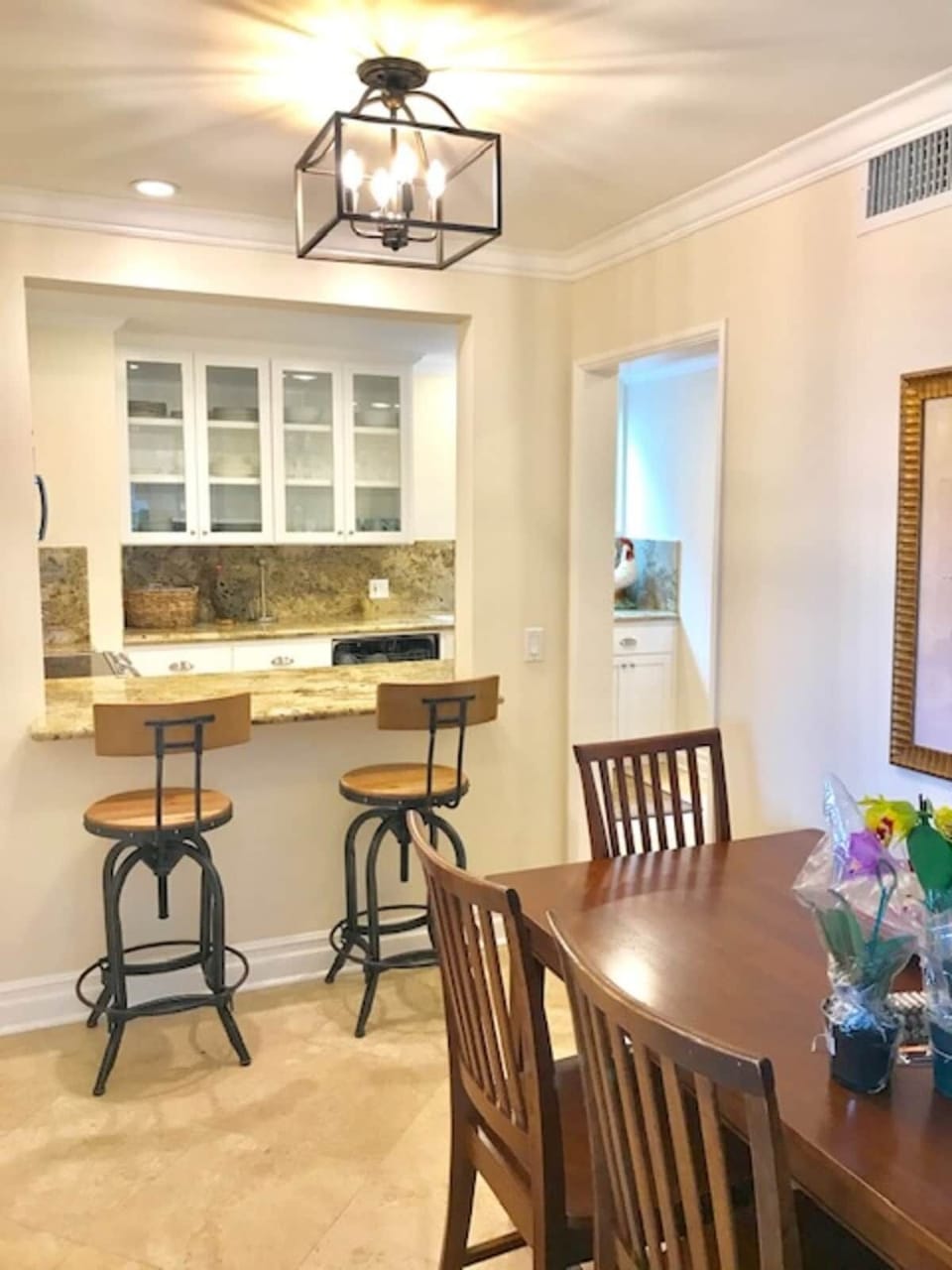 CASA 227 DINING AREA TO KITCHEN NEW STOOLS LIGHTING