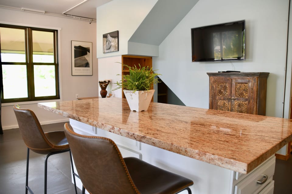 Large marble island in on main floor, great for entertaining and cooking