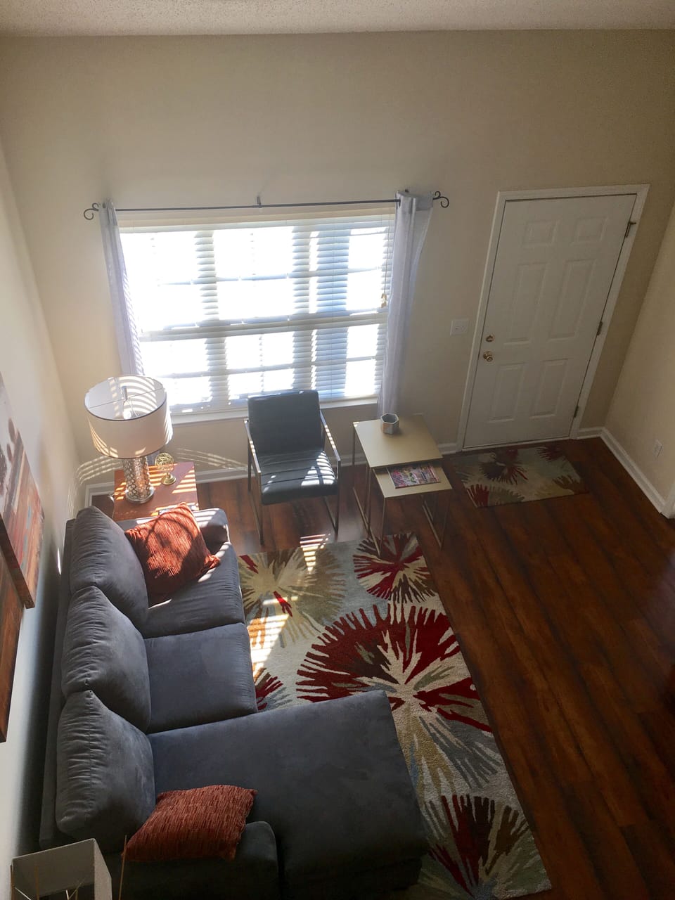 View of living room from loft/office area.