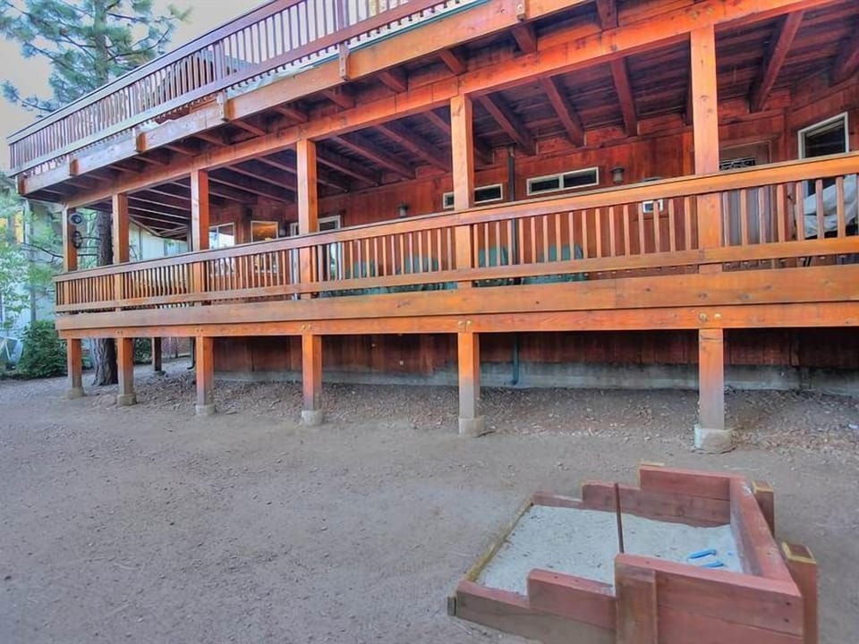 Lower deck and Horse shoe pit in back yard.