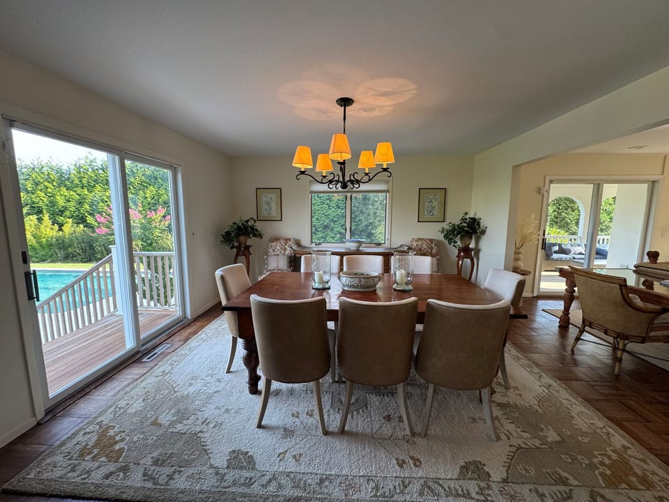 Enjoy meals in our dining room with beautiful views of the backyard & pool.