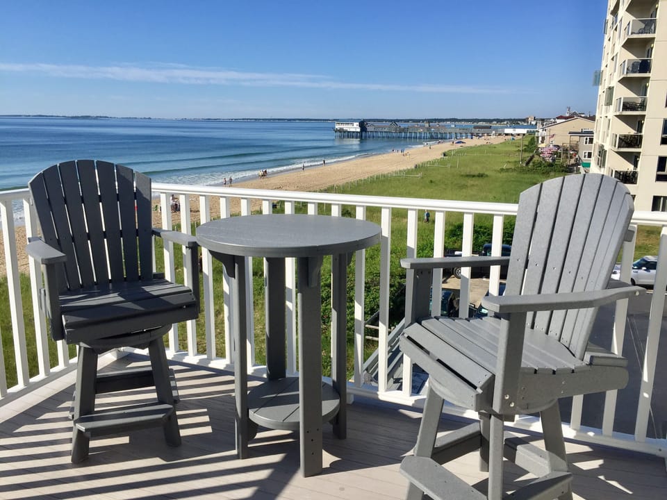 Deck overlooking the beach and pier. 